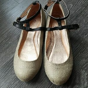 Gold cloth flats with a cute black t-strap.